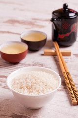 rice, green tea and chopsticks for sushi