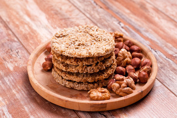 Fototapeta na wymiar homemade oatmeal cookies with nuts and cocos