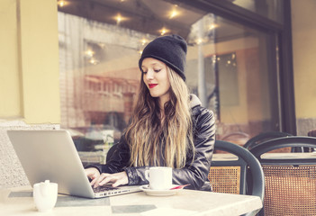 Girl sitting at the cafe