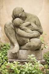 Fototapeta na wymiar Stone statue representing motherhood
