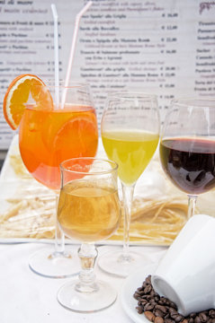 Glasses of spritz aperitif cocktail and other full glasses