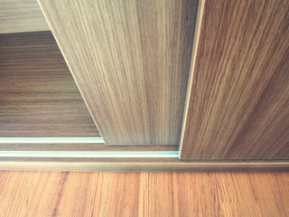 Close up of slide wooden door and rail