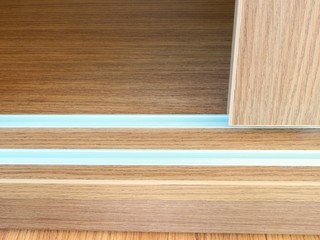 Close up of slide wooden door and rail