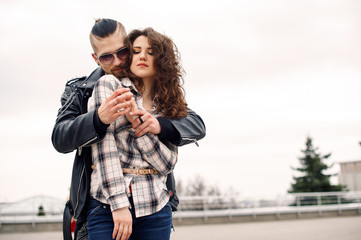 Fototapeta premium Young and happy couple having fun in the city