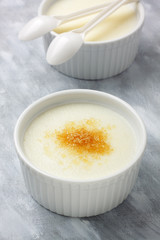 Ramekins filled by wheat semolina (farina) with milk and brown c