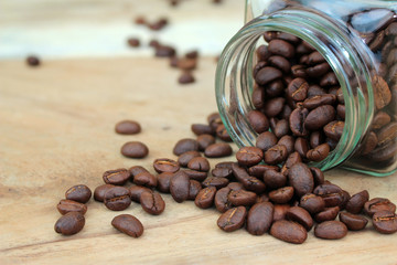 coffee beans in glass bottle