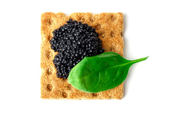 Snack with black caviar