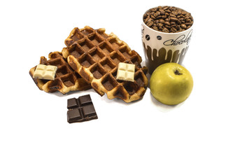 Waffles with chocolate and coffe beans. Isolated