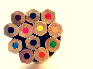 Close up colored pencils isolated on white background