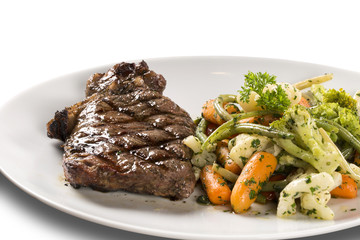 Grilled steaks and vegetables