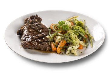 Grilled steaks and vegetables