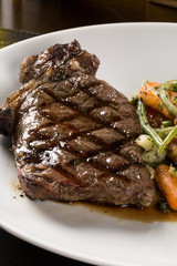 Grilled steaks and vegetables