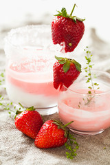 Layered vanila and strawberry milk shake