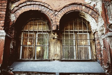 Fototapeta na wymiar Vintage old window with rusty bars