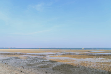 beach and sky when water down