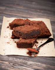 chocolate cake brownies on a wooden background