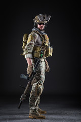 US Army Soldier on Dark Background - 108469621