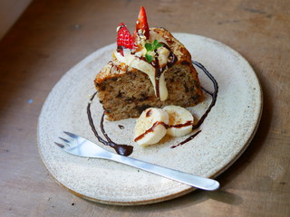 Chocolate banana cake riding of strawberry