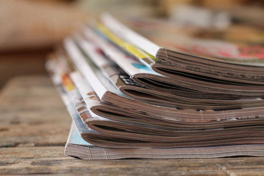 Magazines on the wooden table