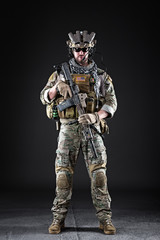 US Army Soldier on Dark Background - 108471420