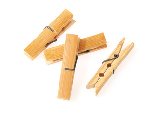 wooden cloth pegs isolated on white background