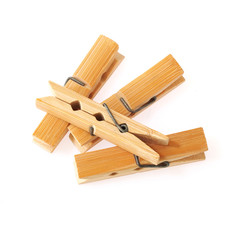 wooden cloth pegs isolated on white background