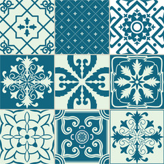 Set of 9 ornamented tiles.