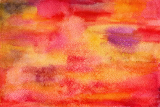 Vibrant abstract artistic watercolor background with red, yellow and purple paint