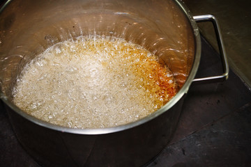 Boiling sugar caramel