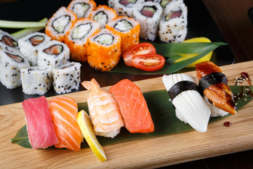 Japanes food. Assorted Sushi nigiri set on a wooden background