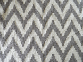 Grey and white chevron material pattern