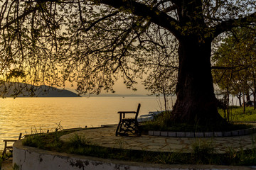 Fototapeta na wymiar Sunset on embankment of Thassos town, East Macedonia and Thrace, Greece 