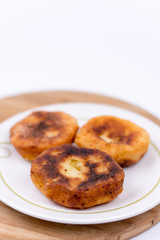 Three homemade donuts served on the plate