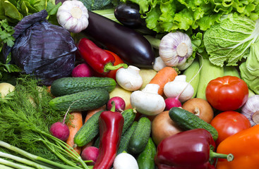 Background of fresh vegetables and greens closeup