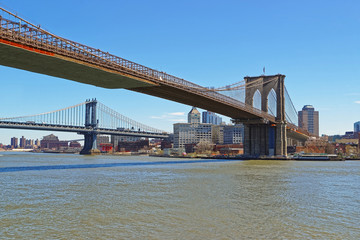 Fototapeta na wymiar View of Brooklyn bridge and Manhattan bridge above East River