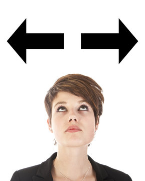 Young woman making a choice with arrows isolated on white background