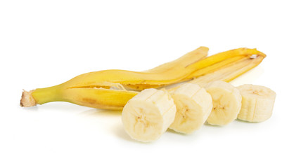 Slice banana with banana skin on white background
