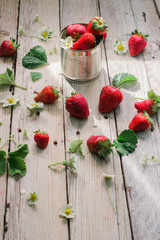 Fresh strawberries on wooden background