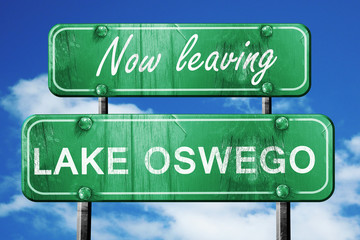 Leaving lake oswego, green vintage road sign with rough letterin