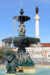 Fototapeta na wymiar Fountain at Rossio Square