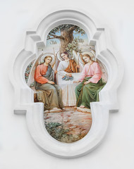 Святая Троица. Барельеф на стене храма Святой Троицы в городе Полтава, Украина.