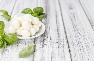 Old wooden table with Mozzarella © HandmadePictures