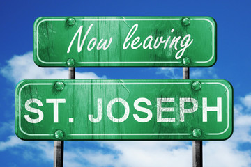 Leaving st. joseph, green vintage road sign with rough lettering