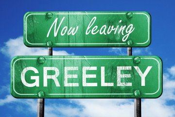 Leaving greeley, green vintage road sign with rough lettering