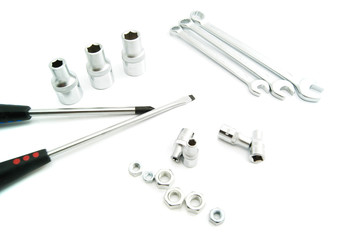 screwdrivers, nuts and wrenches