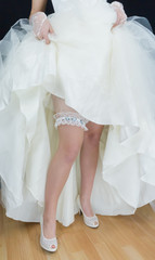 Fototapeta na wymiar bride on black background. dress