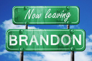 Leaving brandon, green vintage road sign with rough lettering