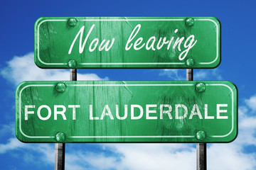 Leaving fort lauderdale, green vintage road sign with rough lett