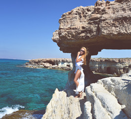 woman with windy hair on mediterranean sea near Cavo Greco place