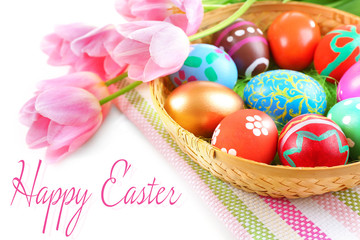 Easter greeting card. Multicoloured eggs and tulips on napkin, closeup